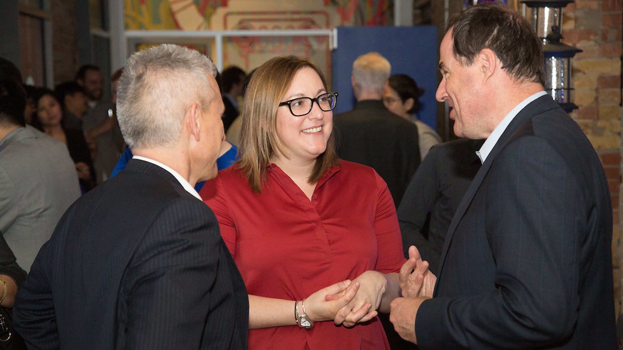 Foteini Agrafioti speaking with Bruce Ross at the party.