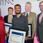 RBC Research Prize 2017 winners on stage with certificates.