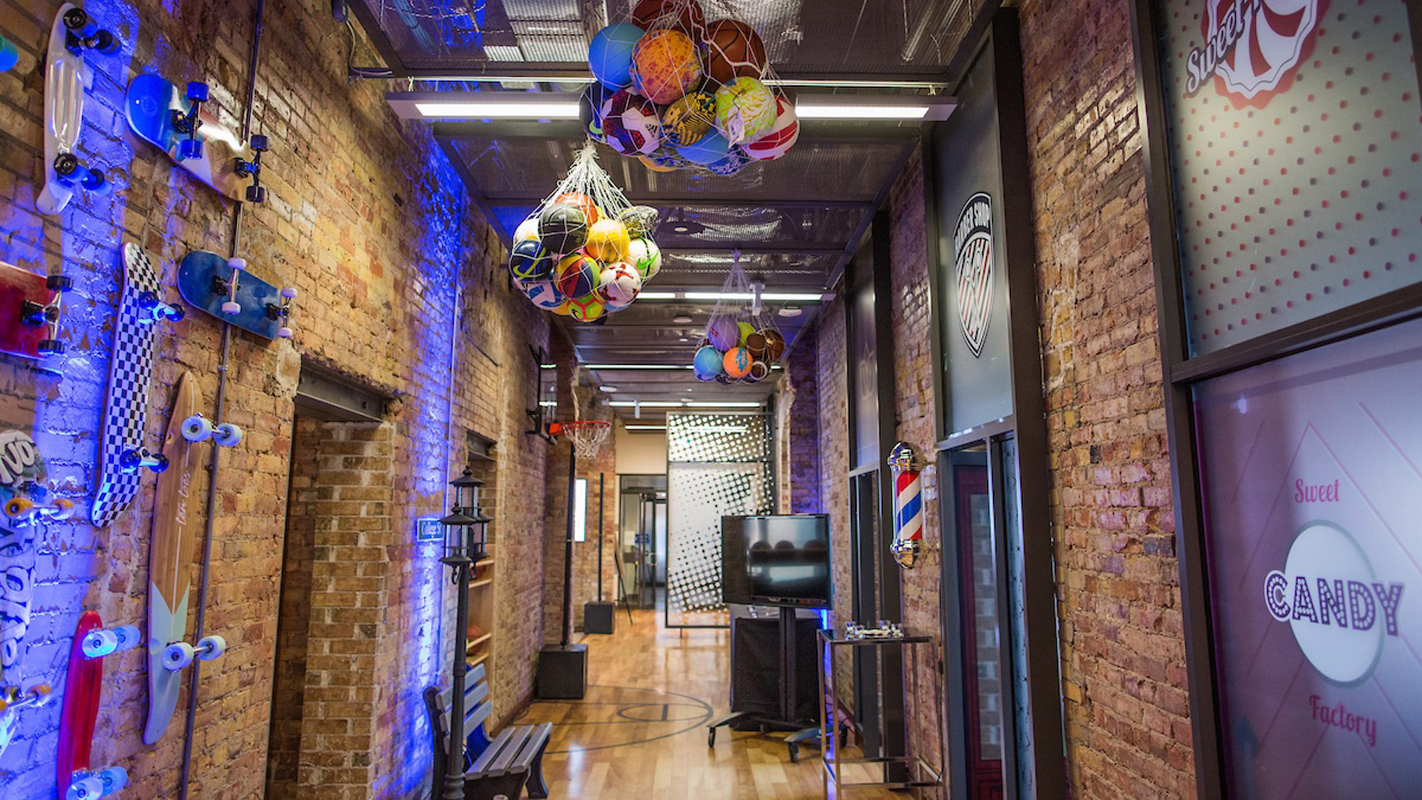 The RBC Borealis Toronto lab hallway, with basketballs hanging in nets from the ceiling.